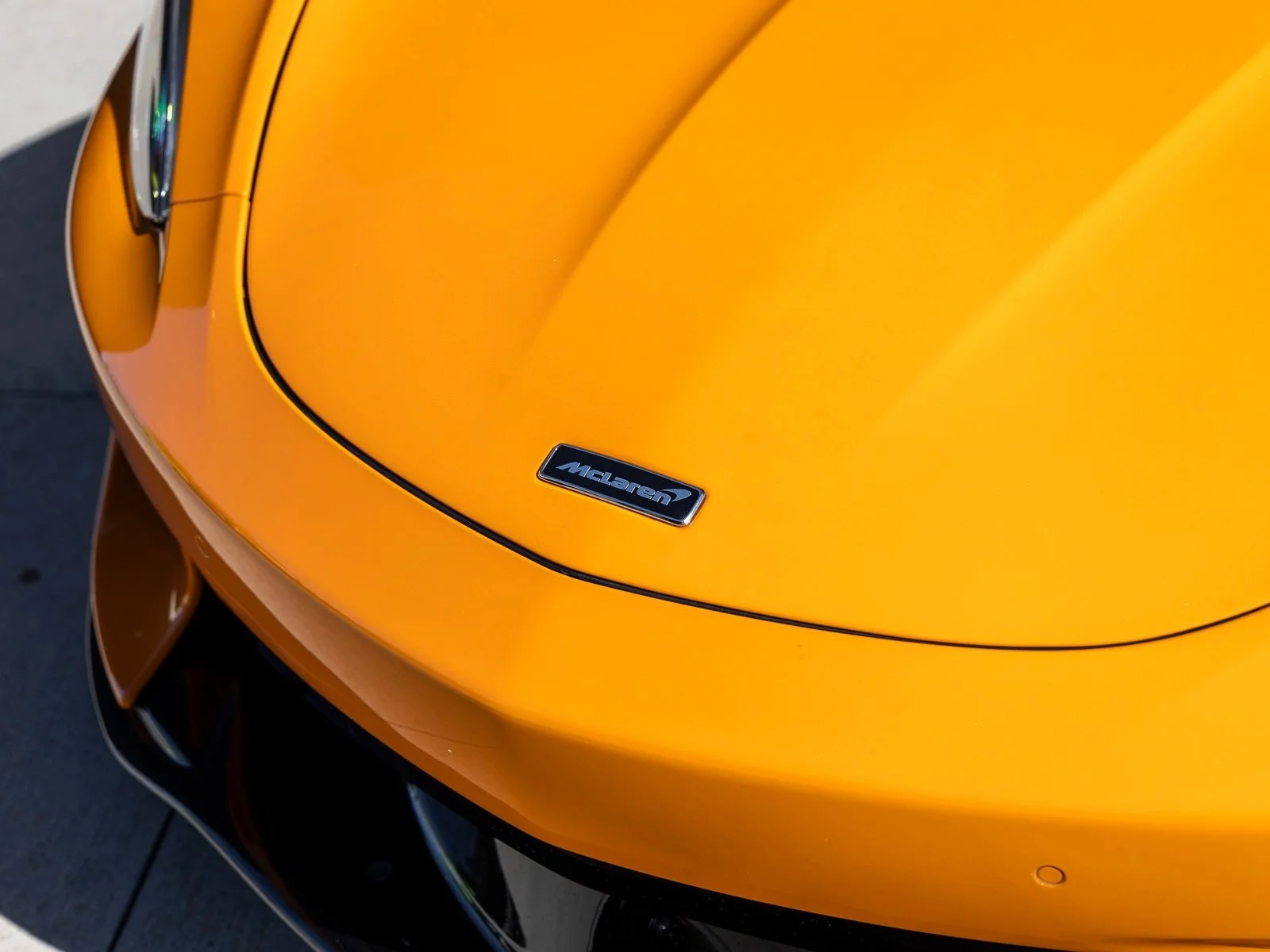 Discover the Legacy of McLaren Papaya Orange in F1 and Luxury Sports Cars