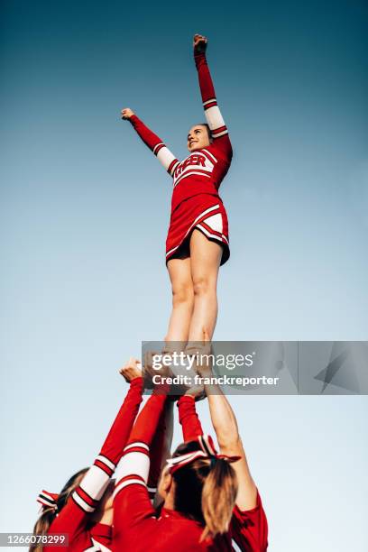Show Stopping Cheerleader Pics: Stunning Photos of Iconic Stunts